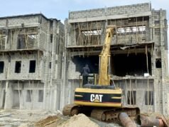 FCTA Demolishes 11 Duplexes Built Under High-Tension Lines in Abuja, Warns Developers